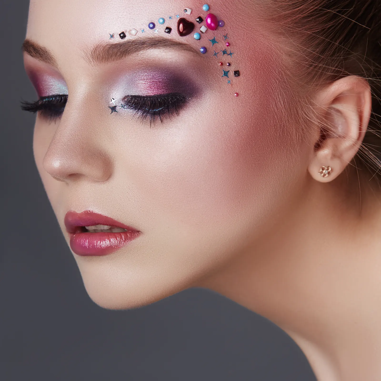 Advanced creative eye makeup with crystal detailing